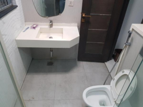 Elegant Room With Kitchen & Lounge in DHA Phase-6 Lahore